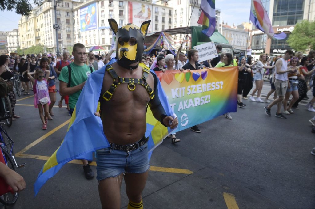 Thousands of Budapest Pride participants protest against the ruling...