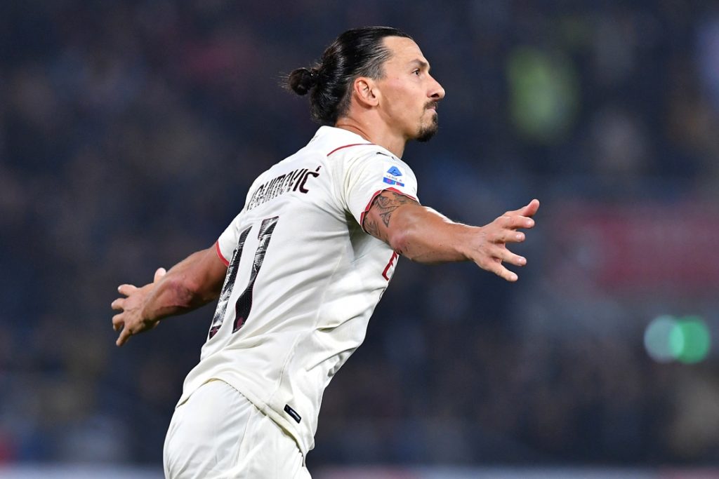 Een owngoal en een doelpunt voor Zlatan Ibrahimovic: AC Milan hijst zich in het slot voorbij Bologna naar de leidersplaats