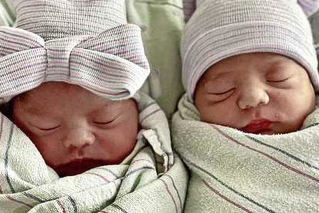 communicate.  Twins born fifteen minutes apart, see the light of day in different years