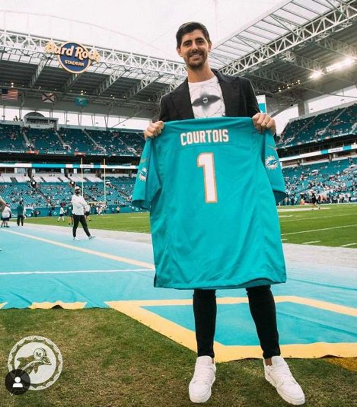 Courtois was handed a personalized Miami Dolphins jersey on the field.