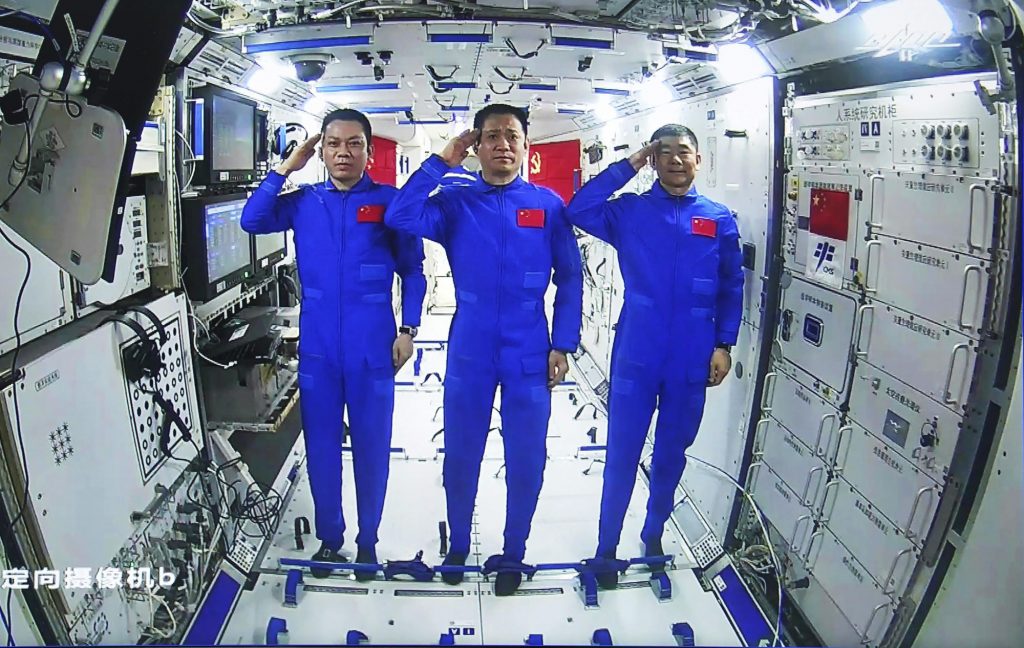 Chinese astronauts walk in space outside the new station for the first time