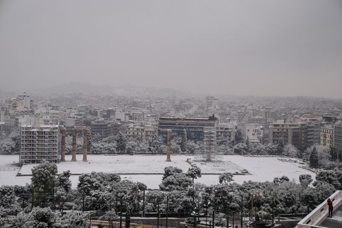 The capital, Athens, is completely covered with white snow.