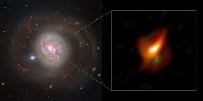A supermassive black hole hidden in a ring of cosmic dust