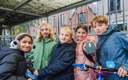 Students measure the air quality on their school driveway