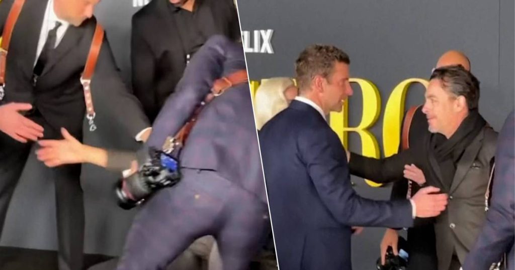 look.  Bradley Cooper helps a struggling photographer at the premiere of the new film |  celebrities