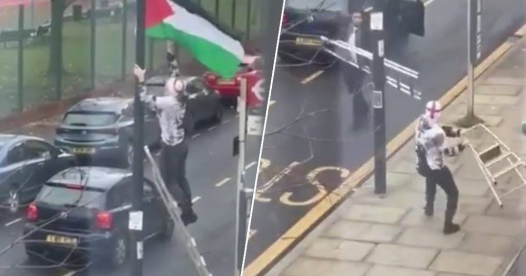 look.  Woman films bizarre fight in London: Men attack each other with ladders after man lowers Palestinian flag |  outside