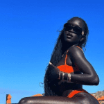 The model nicknamed the “Dark Queen” drops her jaw on the beach (video)